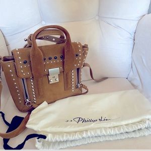 3.1 Phillips Lim Pashli Suede Mini Bag as seen on Schitt’s Creek Alexis Rose